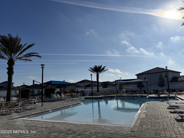 view of pool featuring a patio