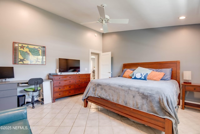 bedroom with light tile patterned flooring, lofted ceiling, and ceiling fan