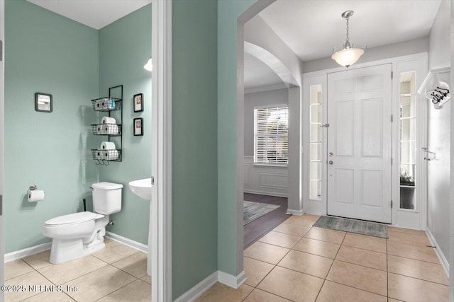 entrance foyer with light tile patterned flooring