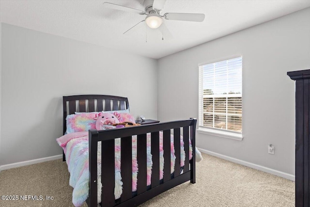 bedroom with light colored carpet and ceiling fan