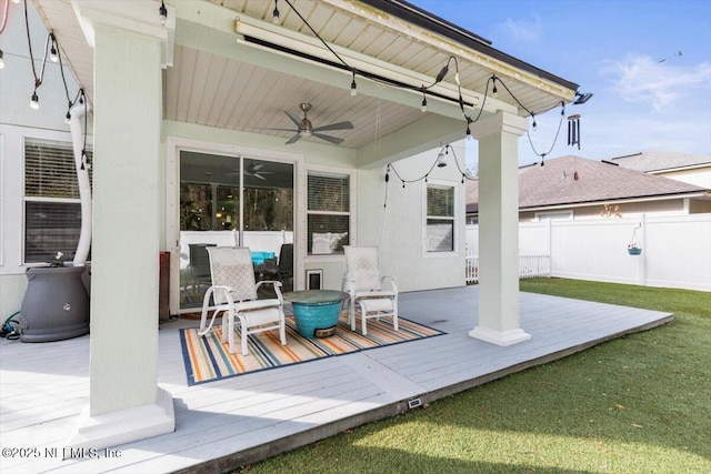 view of patio featuring a wooden deck and ceiling fan