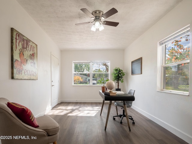 office area with hardwood / wood-style flooring, ceiling fan, and a textured ceiling