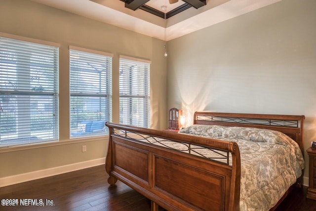 bedroom featuring dark hardwood / wood-style flooring