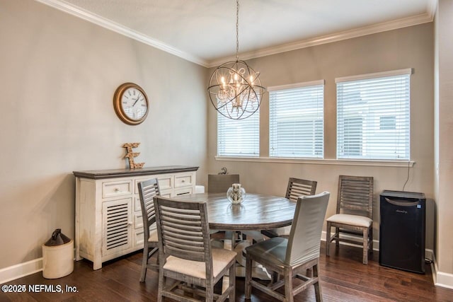 dining room featuring an inviting chandelier, dark wood-type flooring, and ornamental molding