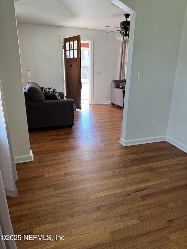 entryway featuring ceiling fan and dark hardwood / wood-style flooring