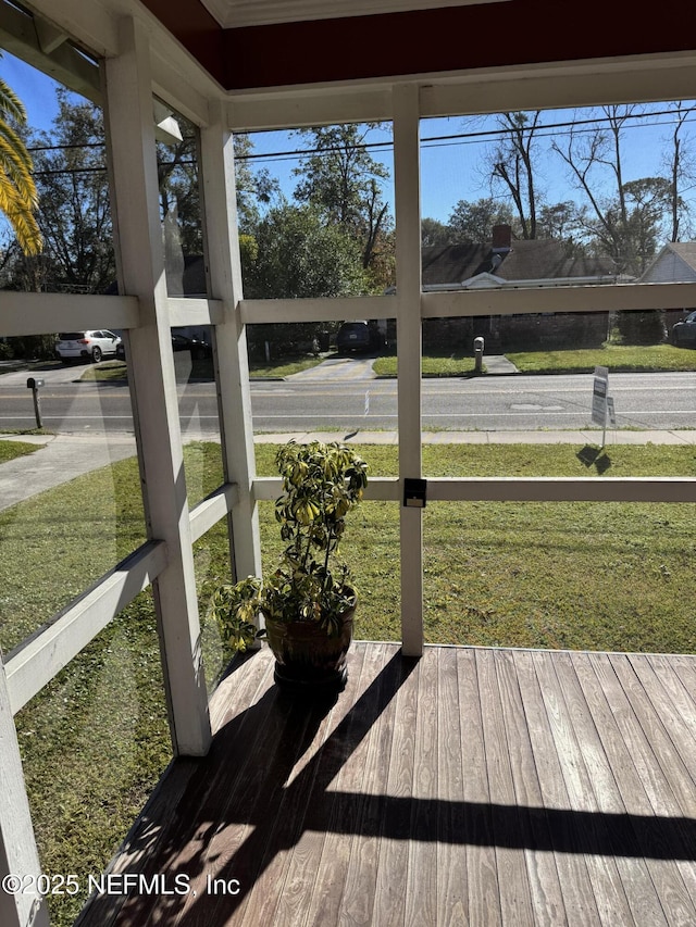 wooden deck with a yard