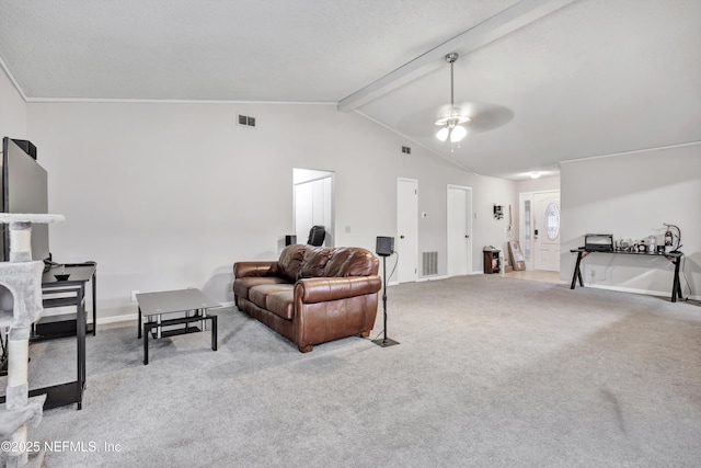 carpeted living room featuring vaulted ceiling with beams and ceiling fan