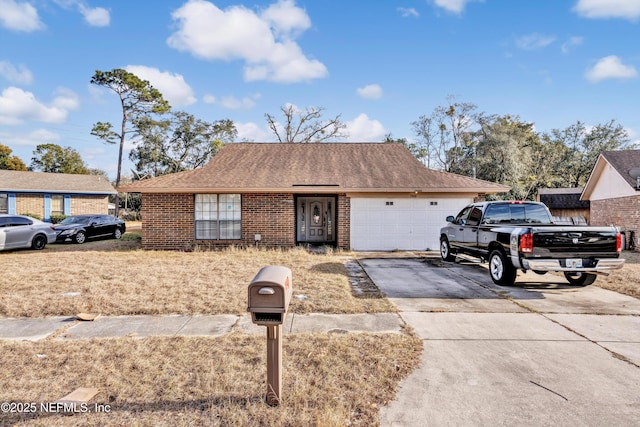 view of front of property with a garage