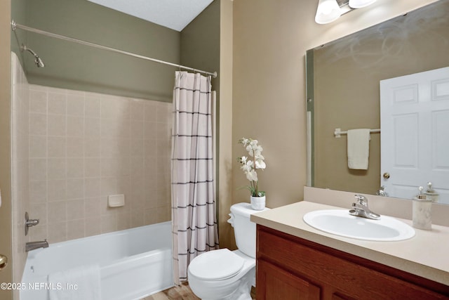 full bathroom with vanity, toilet, and shower / bath combo with shower curtain