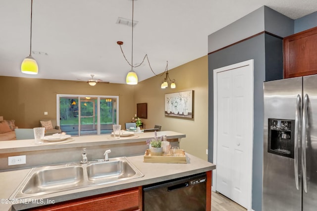 kitchen featuring stainless steel refrigerator with ice dispenser, sink, black dishwasher, pendant lighting, and ceiling fan