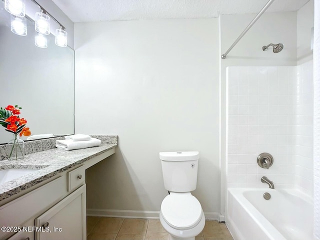 full bathroom with tile patterned floors, toilet,  shower combination, a textured ceiling, and vanity