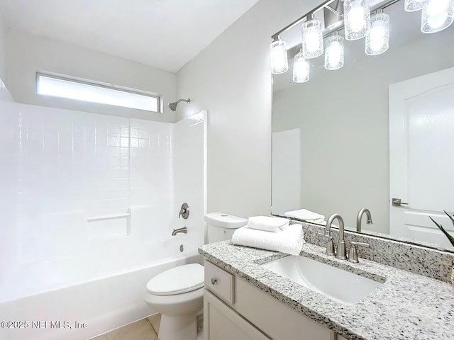 full bathroom with vanity, toilet, tile patterned flooring, and shower / bathing tub combination