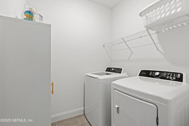 laundry room featuring separate washer and dryer