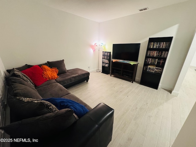 181 Varner Way, Saint Augustine, FL 32092 - living room with baseboards, wood finished floors, and visible vents
