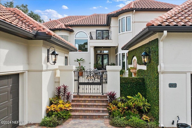 doorway to property with a balcony