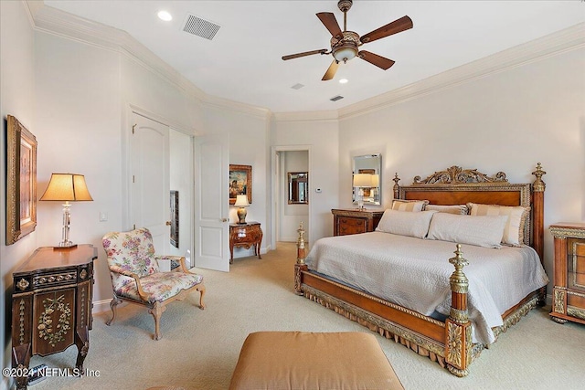 bedroom with crown molding, ceiling fan, and light carpet