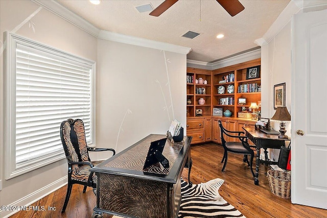 office with ceiling fan, ornamental molding, wood-type flooring, and a textured ceiling