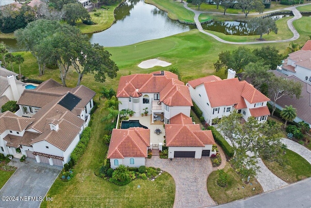 bird's eye view with a water view