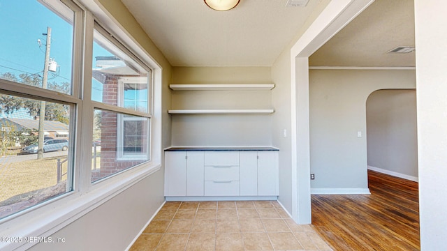 interior space featuring light tile patterned floors