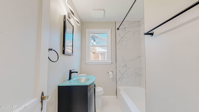 full bathroom featuring vanity, toilet, and tiled shower / bath