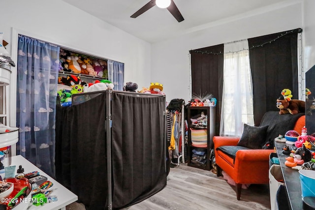 interior space featuring ceiling fan