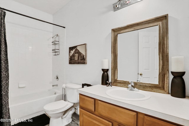 full bathroom with vanity, shower / bath combination with curtain, and toilet