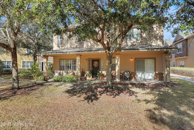 view of front of property with a front yard