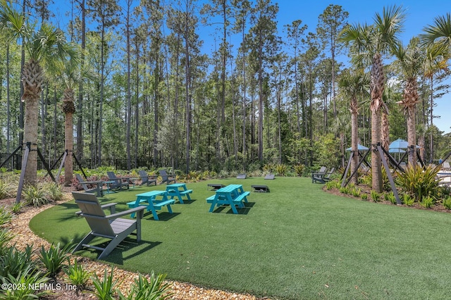 view of home's community featuring a yard