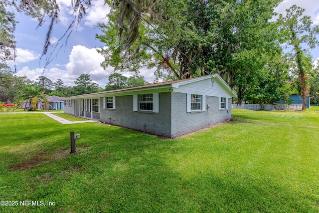 exterior space with a front yard