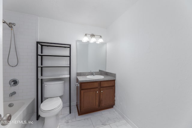 full bathroom with tiled shower / bath, vanity, and toilet