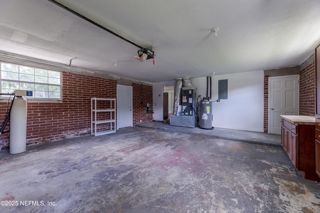 garage with a garage door opener, electric water heater, heating unit, and electric panel