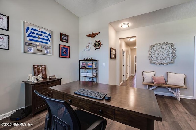 office with dark hardwood / wood-style floors