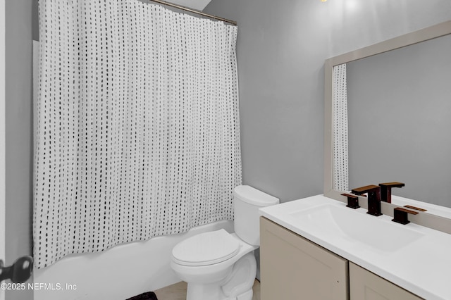 bathroom with walk in shower, vanity, and toilet