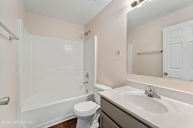 full bathroom featuring bathtub / shower combination, vanity, toilet, and wood-type flooring