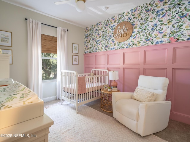 bedroom with light colored carpet and ceiling fan