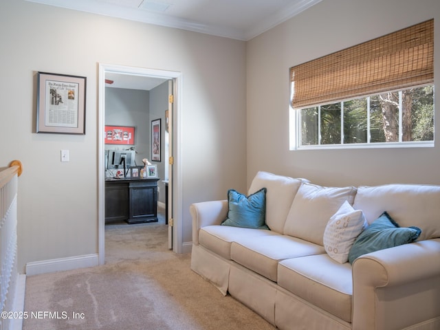 carpeted living room featuring crown molding