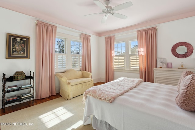 bedroom featuring dark wood-type flooring and ceiling fan