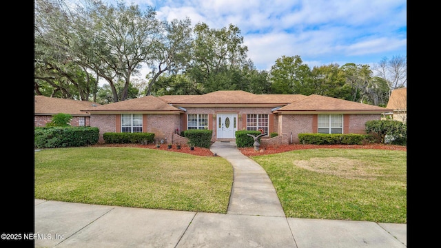 single story home with a front yard