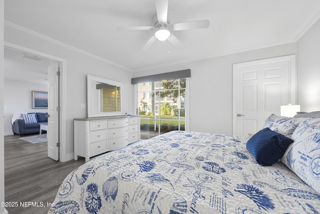 bedroom with ceiling fan, ornamental molding, and dark hardwood / wood-style flooring