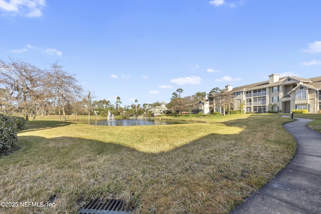 view of yard with a water view