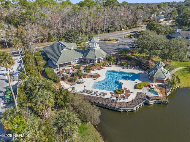 birds eye view of property featuring a water view