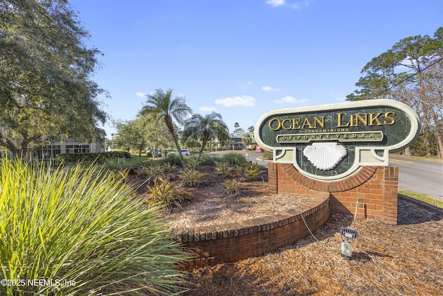 view of community sign