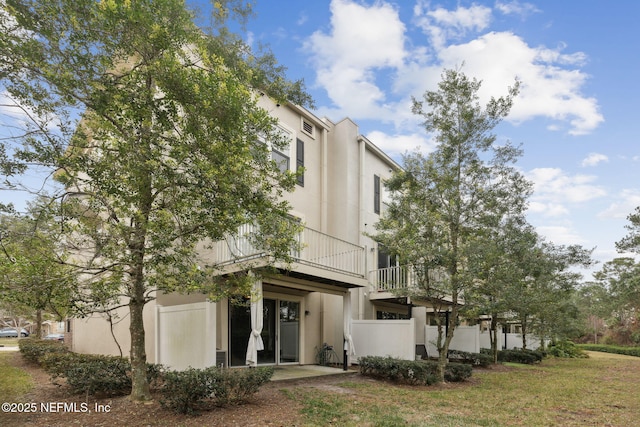 exterior space with a front lawn