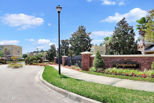 view of community sign