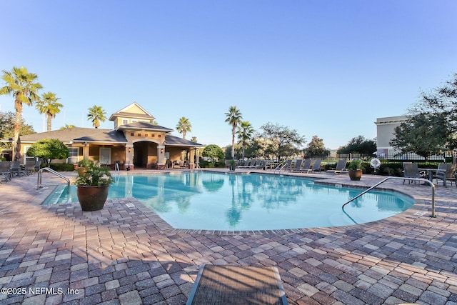 view of swimming pool featuring a patio area