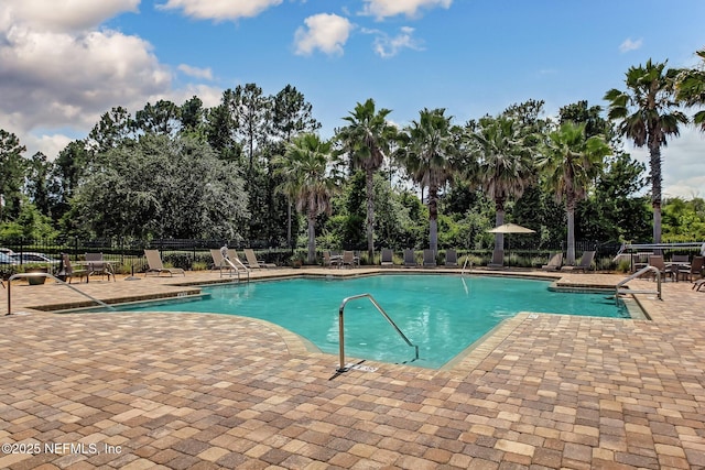 view of pool featuring a patio