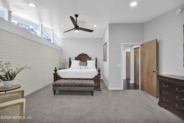 bedroom with brick wall, carpet flooring, and ceiling fan