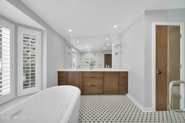 bathroom featuring vanity and plus walk in shower