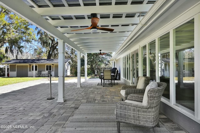 view of patio with ceiling fan