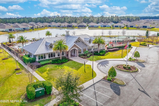 bird's eye view with a water view